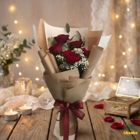Classic romance red rose bouquet wrapped in elegant brown paper with soft candlelight background